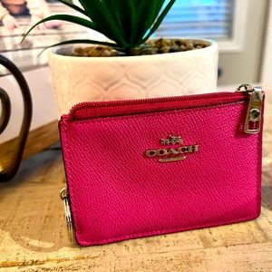 Coach wallet keychain. Beautiful pink color only used a couple of times.